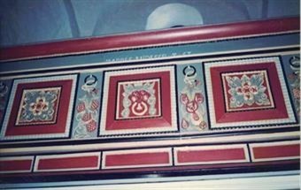 The decorated balcony of the ancient church in Raumland