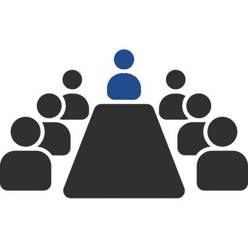 Eine Gruppe Menschen an einem Konferenztisch